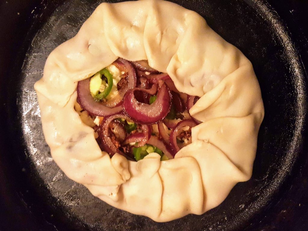 tomato galette in folded over pie shell