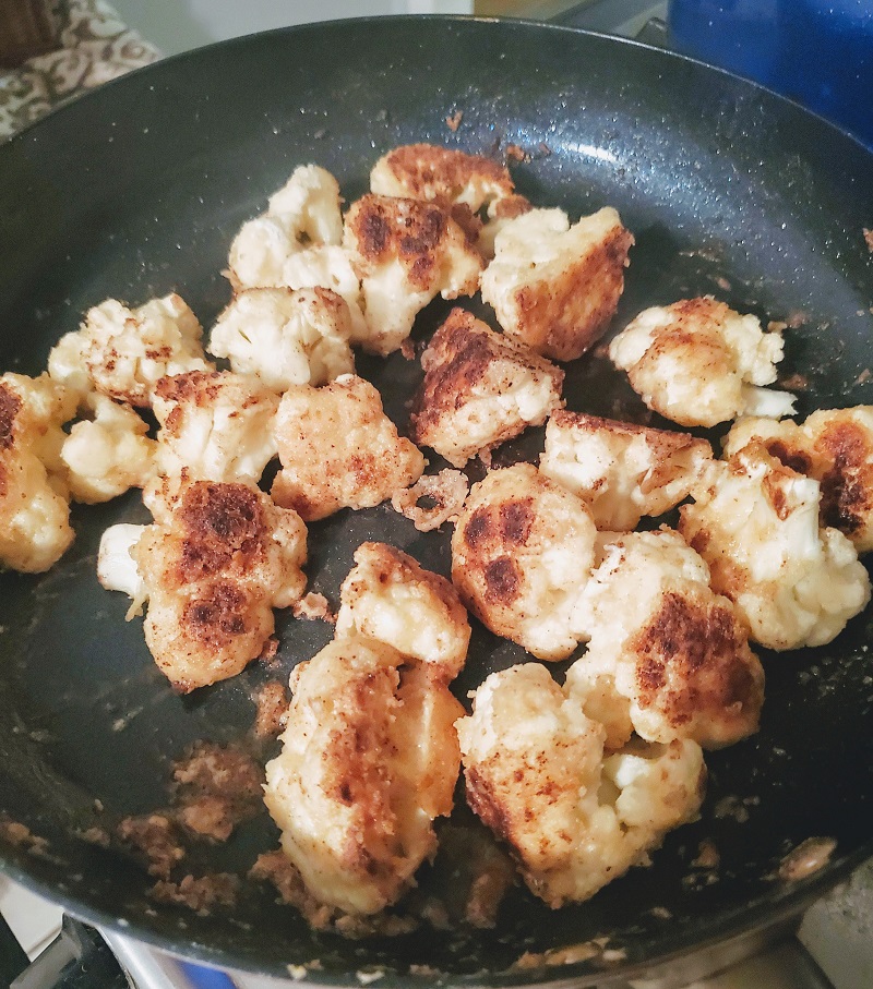 browning cauliflower in saute pan