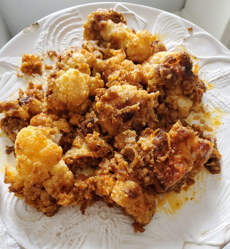 buffalo cauliflower bites on white plate