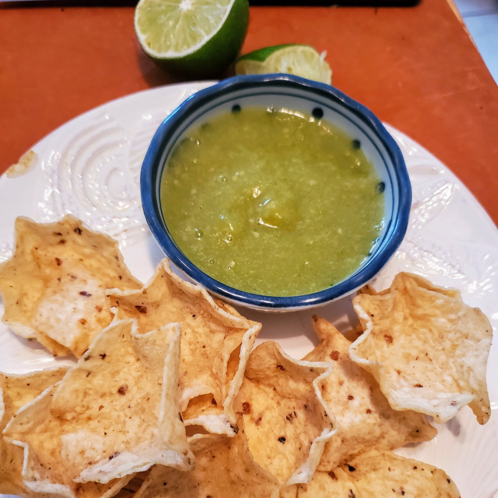 plate of chips and salsa verde