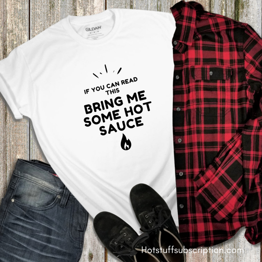 styled tshirt that reads "If you can read this, bring me hot sauce".
